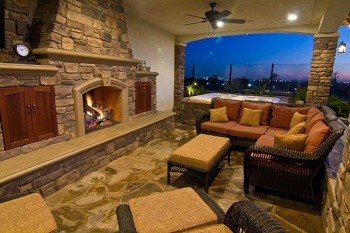 Enjoy an outdoor living space with a fireplace.
